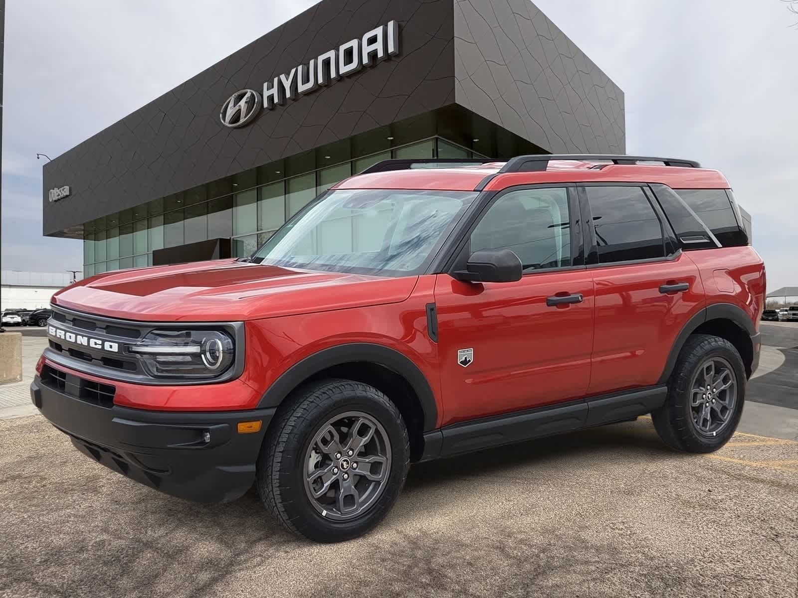 2022 Ford Bronco Sport Big Bend in Hot Pepper Red Tinted Clearcoat — front three-quarter view