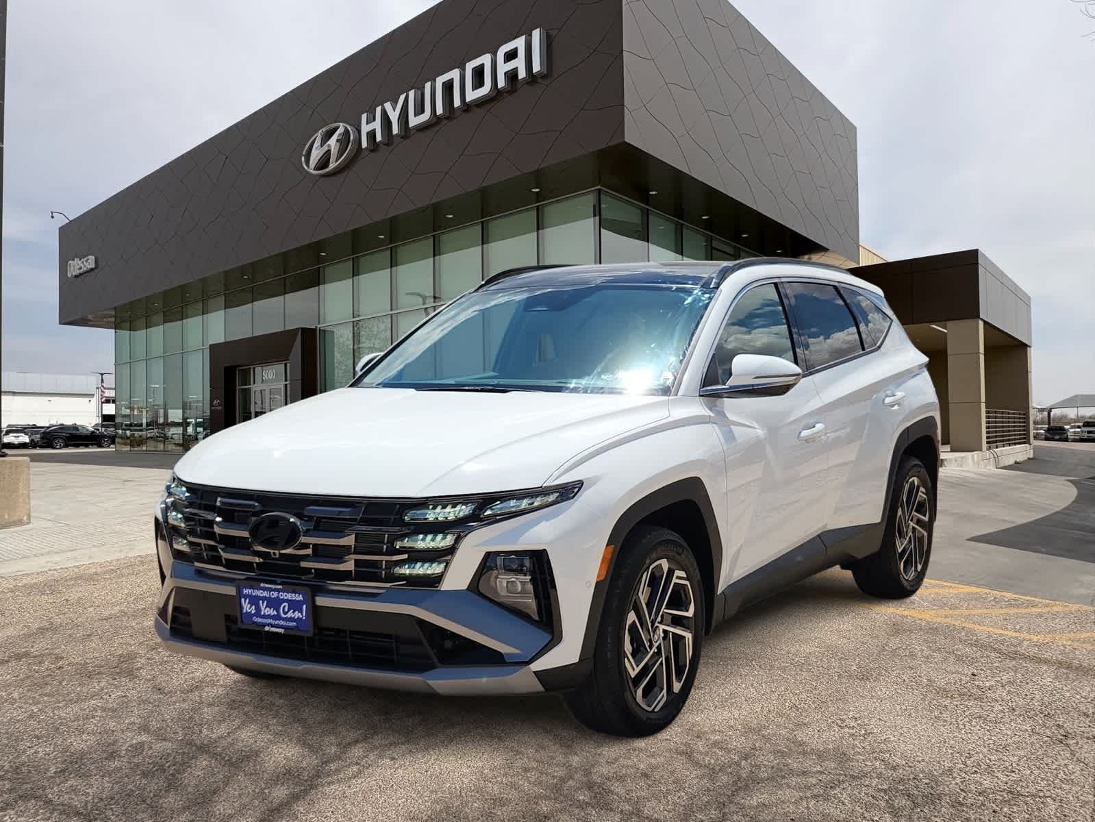 2025 Hyundai TUCSON Limited in Serenity White Pearl — front three-quarter view